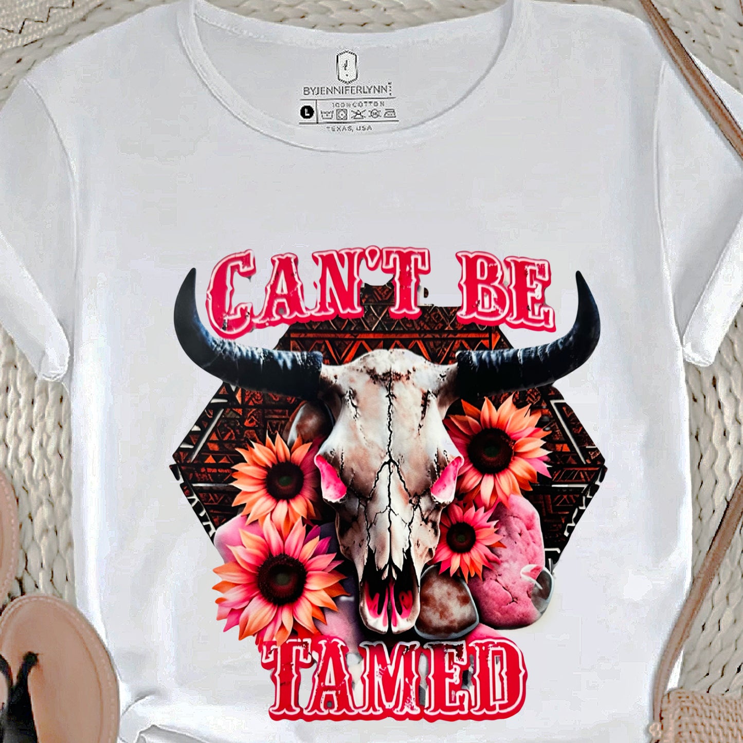 "CAN'T BE TAMED"