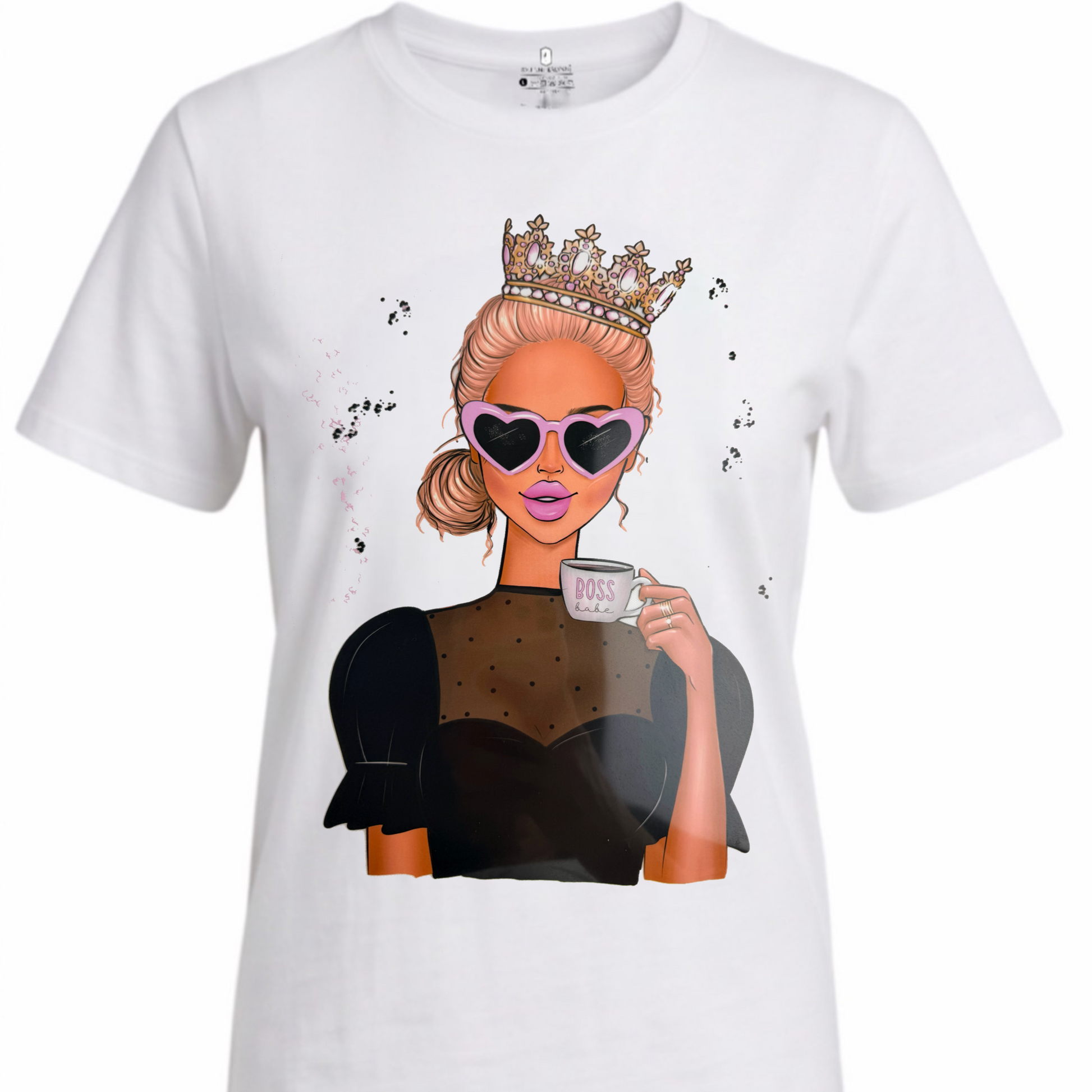 A white short-sleeve crewneck t-shirt featuring a graphic print of a blonde woman wearing a gold crown, heart-shaped sunglasses, and a black dress while holding a coffee cup.