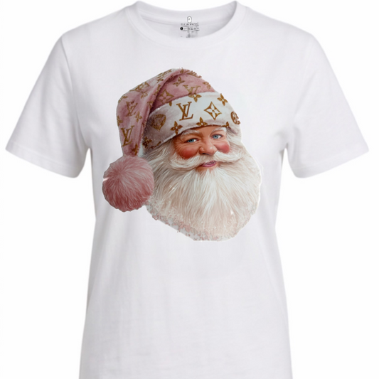 A white short-sleeve crewneck t-shirt featuring a large graphic print of Santa Claus's face wearing a pink and gold Louis Vuitton monogrammed hat. The brand 'Louis Vuitton' is visible on the inner neck label.