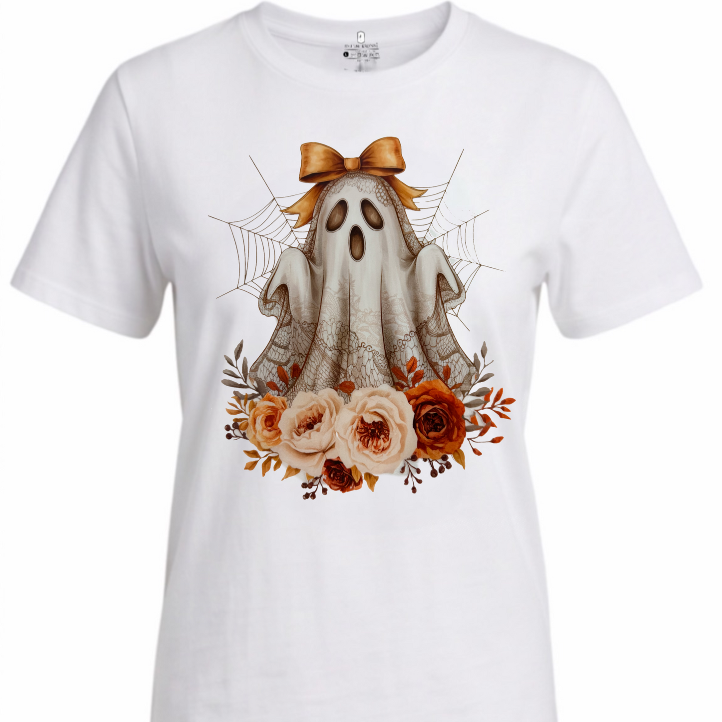 A white short-sleeve crewneck t-shirt featuring a central graphic of a cute cartoon ghost with a brown bow, surrounded by orange and pink roses, spiderwebs, and spider legs.